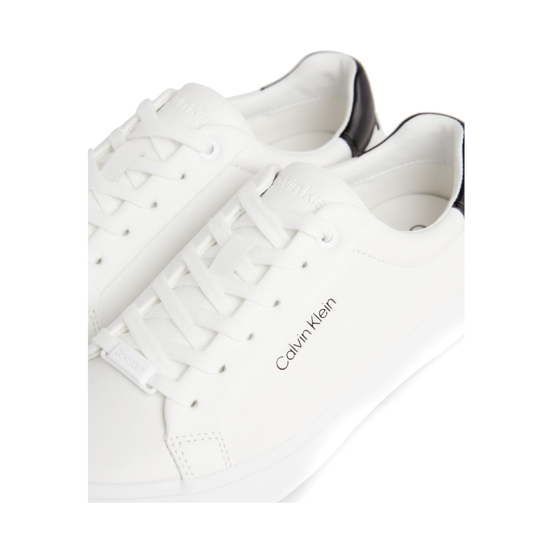 Calvin Klein womens white, black vulcanized lace up leisure trainers | Vilbury London