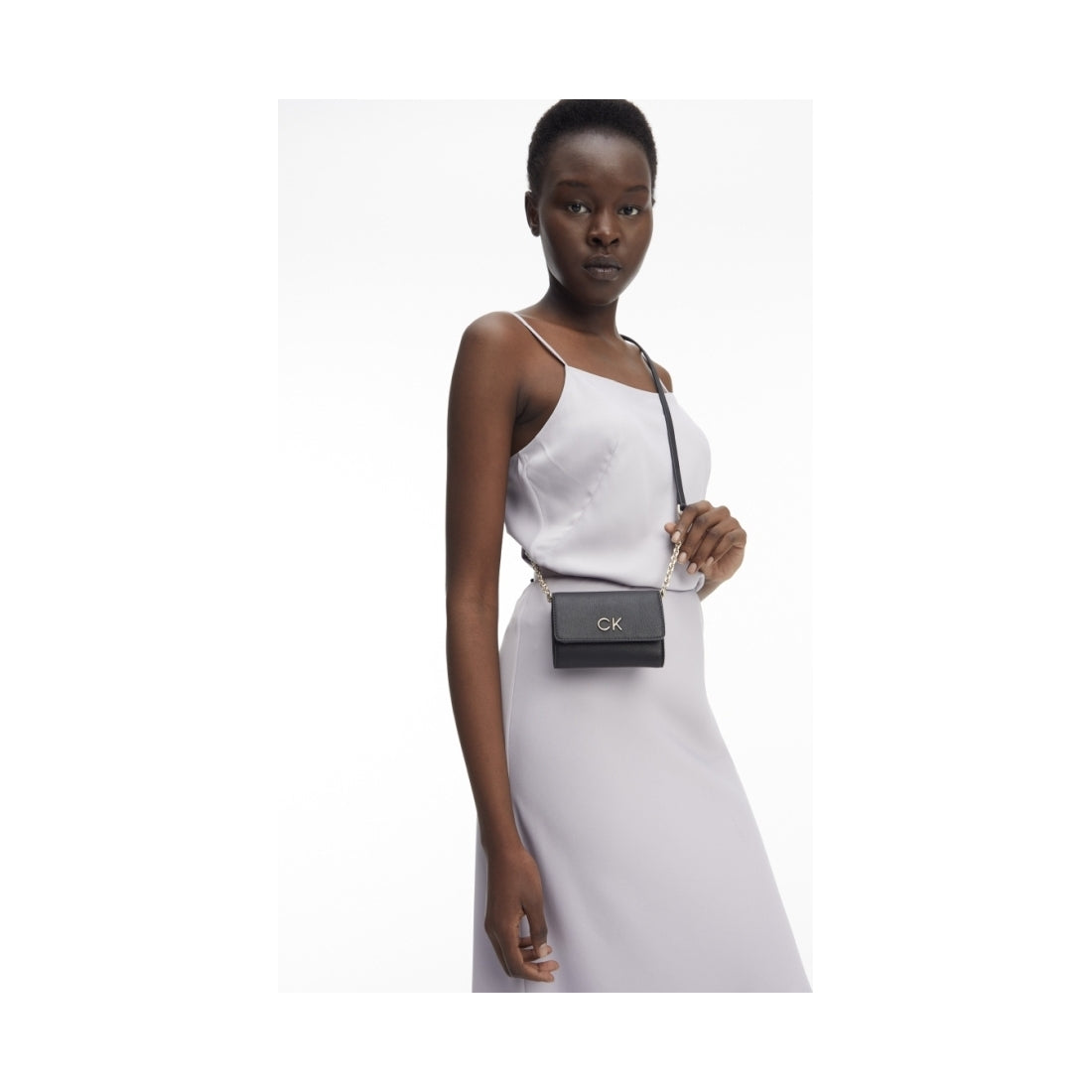 Calvin Klein womens black re-lo strap crossbody | Vilbury London