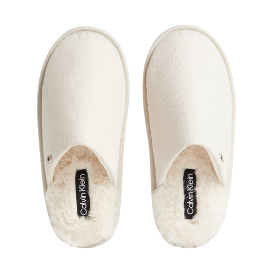 Calvin Klein womens Neutral Mono slipper flatform mule w/hdw-jq | Vilbury London
